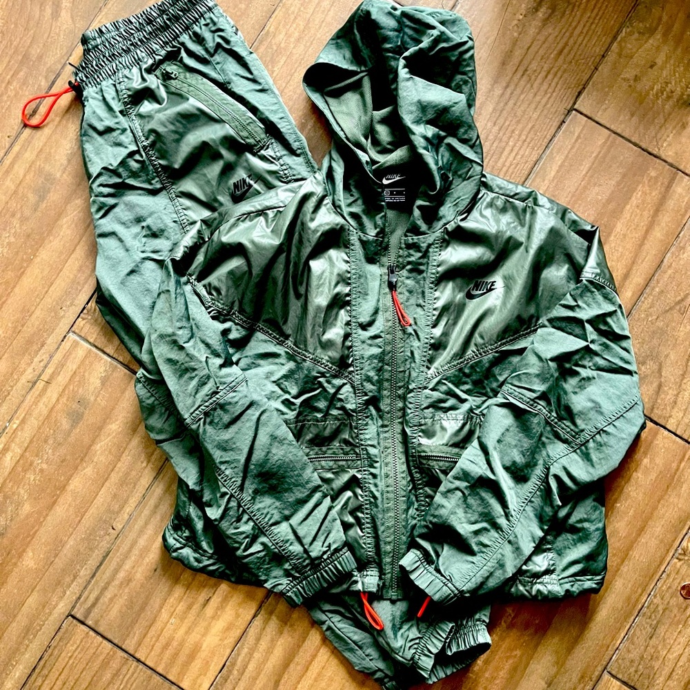 Nike Womens track suit. Olive green with orange accents.